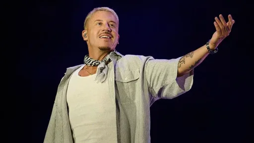 Macklemore Removed from Ed Sheeran Tour After Stadium Refusals